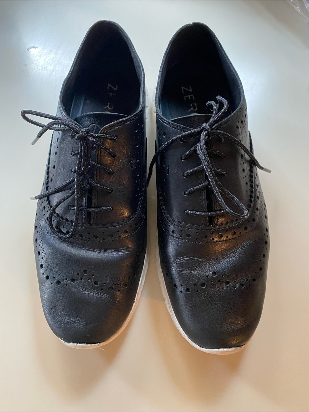 Women’s Sz 8B Cole Haan Black Wingtip Derby Sneakers with White Sole